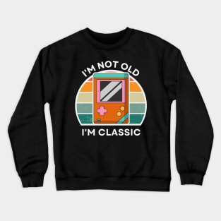 I'm not old, I'm Classic | Handheld Console | Retro Hardware | Vintage Sunset | '80s '90s Video Gaming Crewneck Sweatshirt